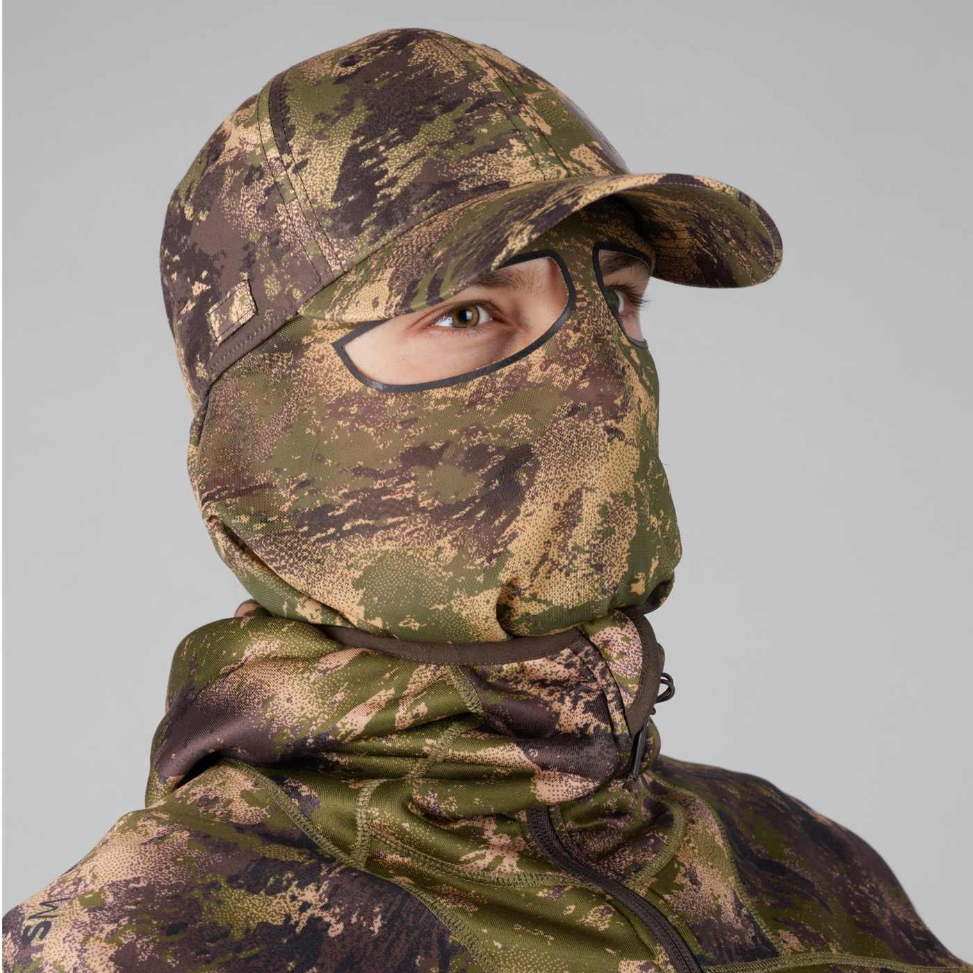 Härkila Cap mit Tarnnetz Deer Stalker in der Farbe Camo