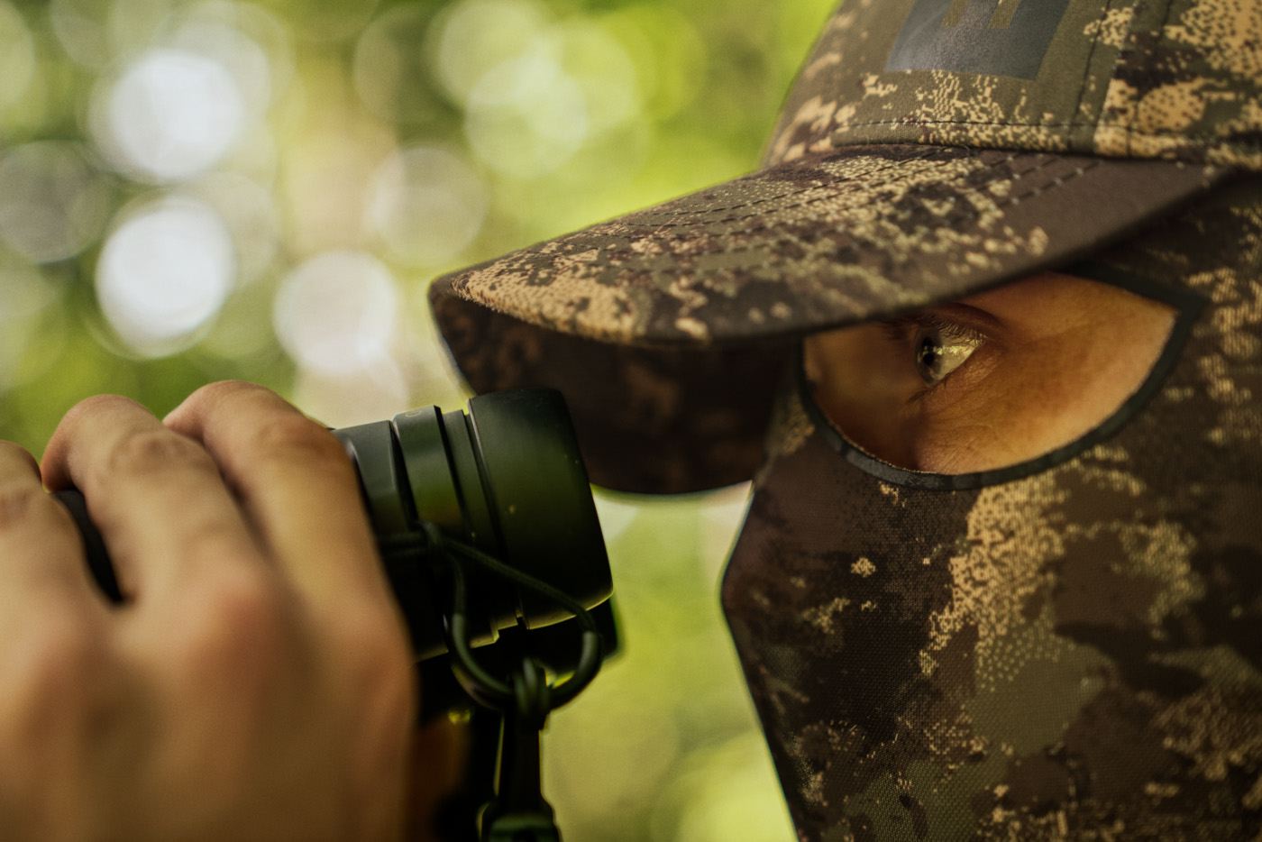 Härkila Cap mit Tarnnetz Deer Stalker in der Farbe Camo